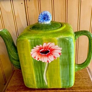Gerber Daisy, Green Floral Ceramic Teapot by Jay Imports, 7”x8”.